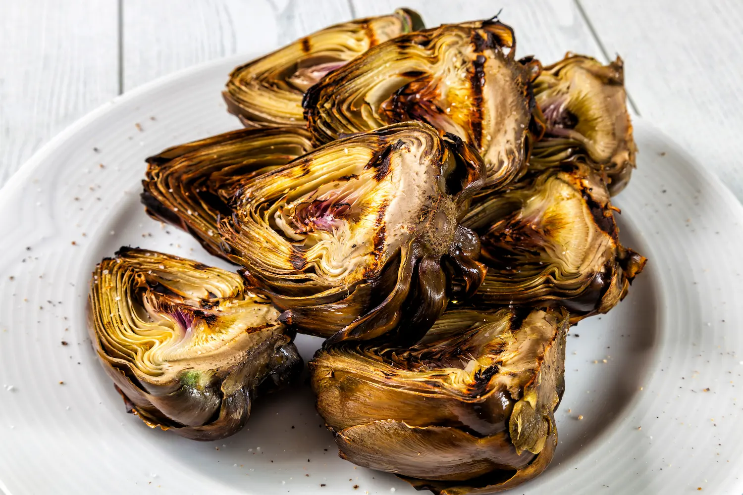 Grilled artichokes on a plate